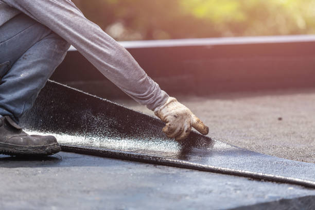 Professional Basement Waterproofing technician working in Spiro, OK